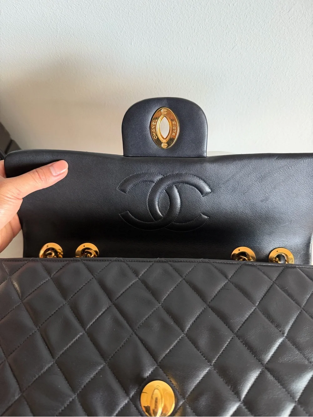 CHANEL Black Quilted Shoulder Bag with Gold Chain & CC Lock